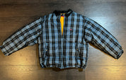 Supreme Plaid Puffer Jacket – Worn by Chris Brown