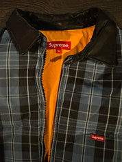 Supreme Plaid Puffer Jacket – Worn by Chris Brown