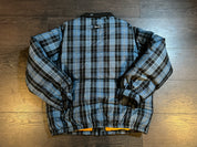 Supreme Plaid Puffer Jacket – Worn by Chris Brown